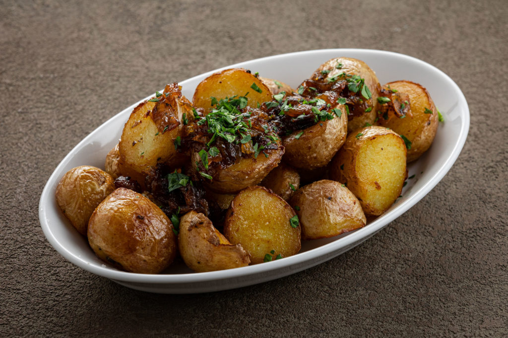 Fried boiled new potatoes